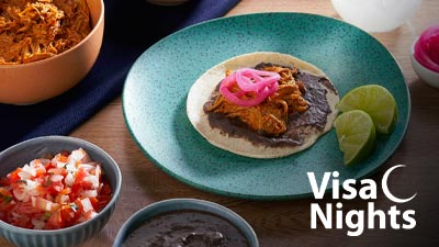 Plato de comida + logo Visa Nights